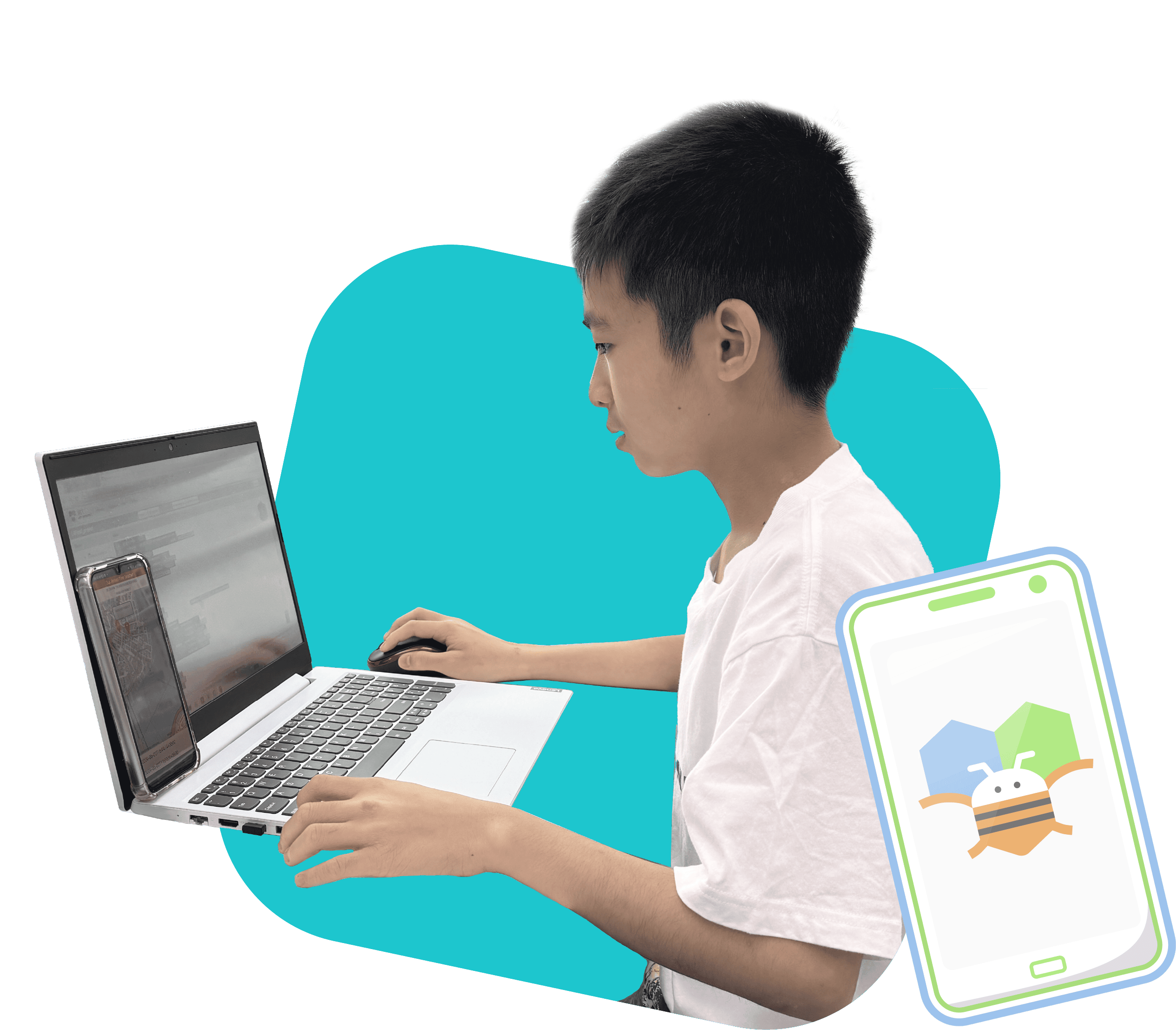 Boy coding a mobile app using AppInventor during a class at RoboCode Academy.